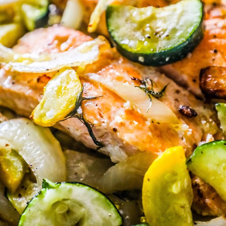 salmon and zucchini and squash in a foil pocket