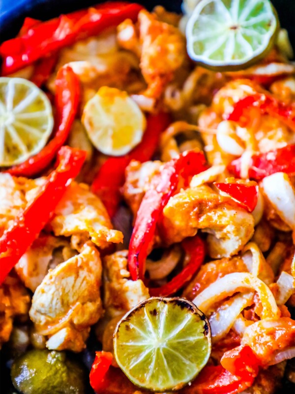 Skillet-Baked Chicken Fajitas with Peppers and Limes.