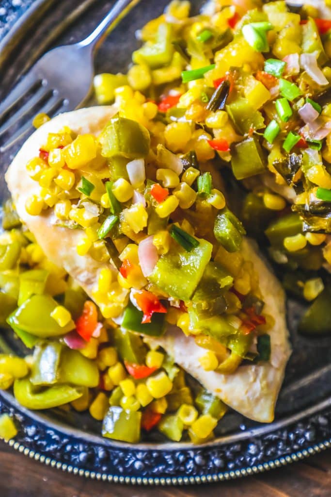 chicken topped with pineapple, pepper, corn, and green onions
