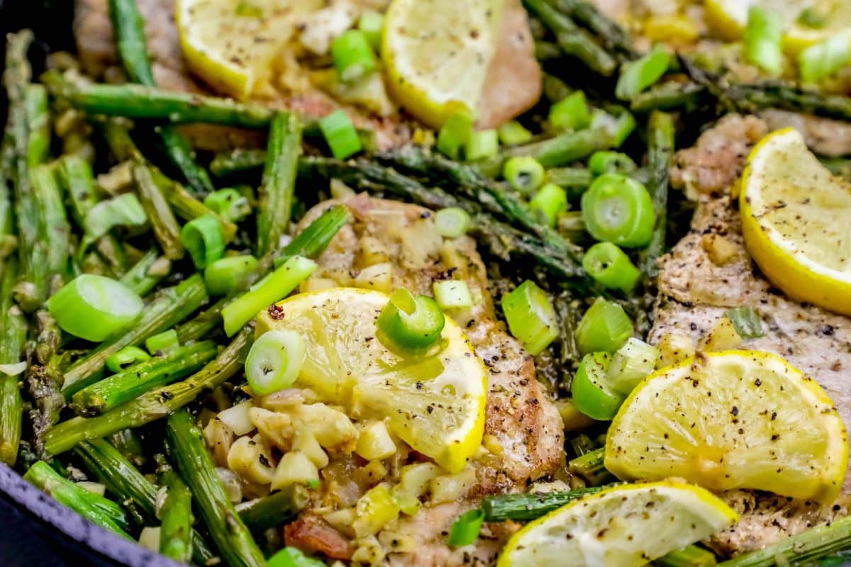 one pot lemon garlic pork chops and asparagus skillet meal