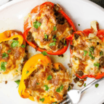 Baked Philly Cheesesteak Stuffed Peppers on a plate.