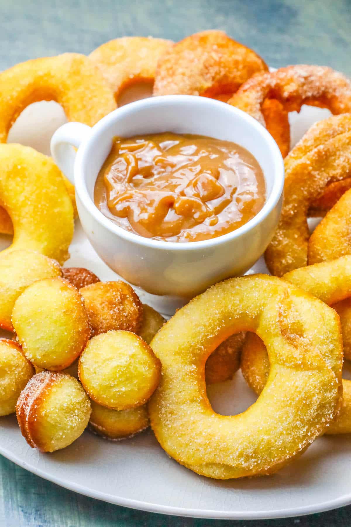 donuts and donut holes around caramel