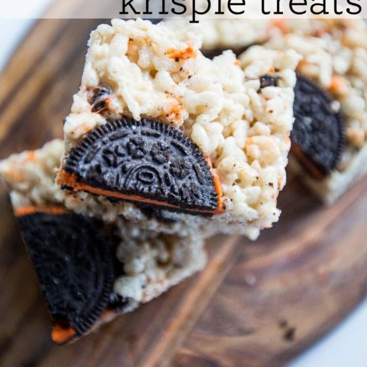 Krispie treats made with Halloween Oreos displayed on a cutting board.