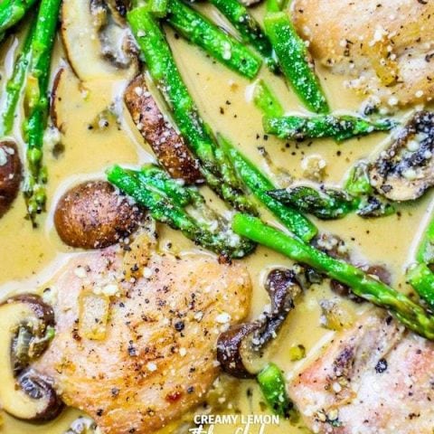 Creamy Italian chicken with mushrooms and asparagus in a white sauce.