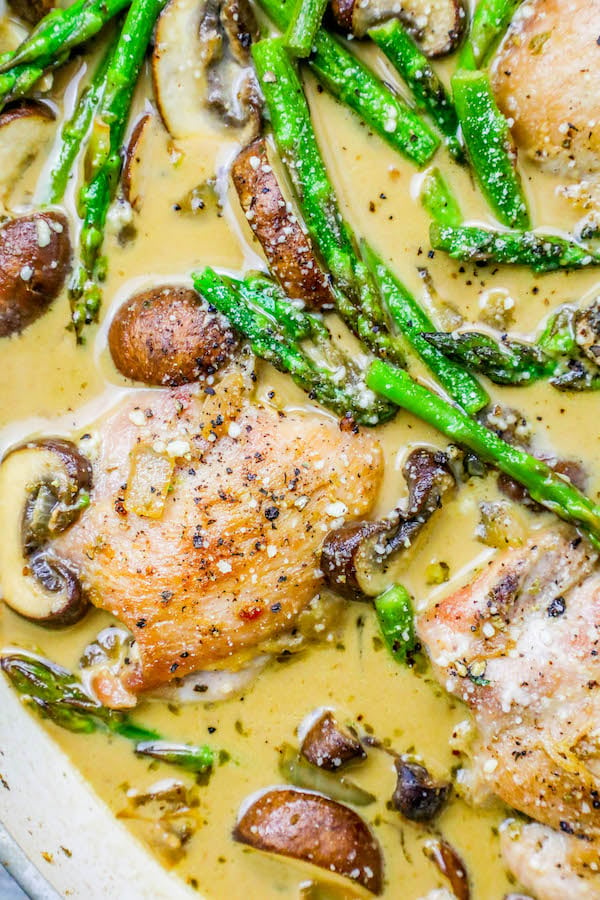 pan with chicken, asparagus, mushrooms, and creamy sauce