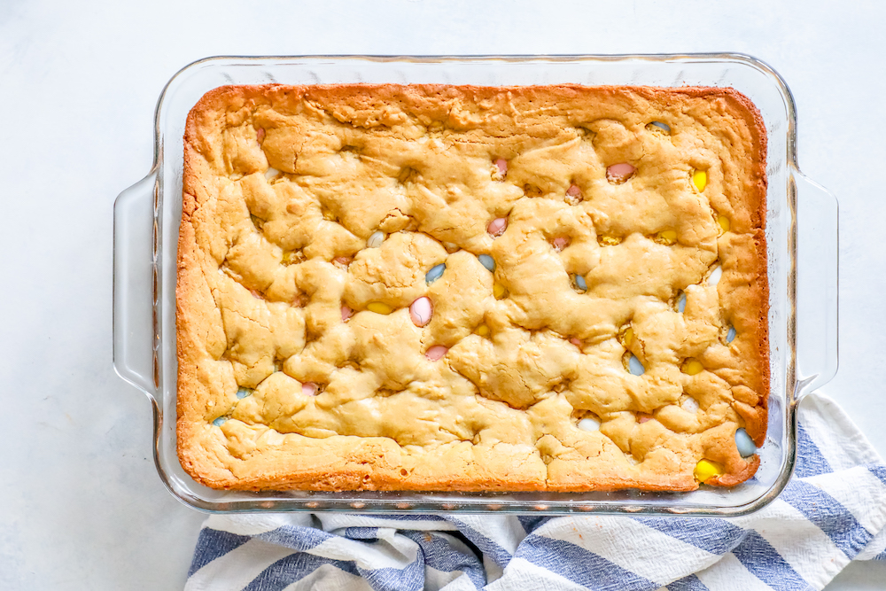 blondies, easter candy blondies, recipes with easter candy, cadbury mini egg recipes, baking with cadbury mini eggs, easter blondies recipe, cadbury mini eggs blondies recipe, leftover easter candy recipe, easter party dessert ideas, easy easter party snack, cooking with easter candy, the best blondies recipe,