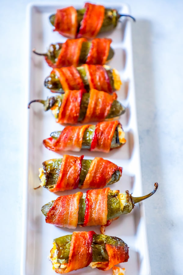 picture of bacon wrapped jalapeno poppers on a plate