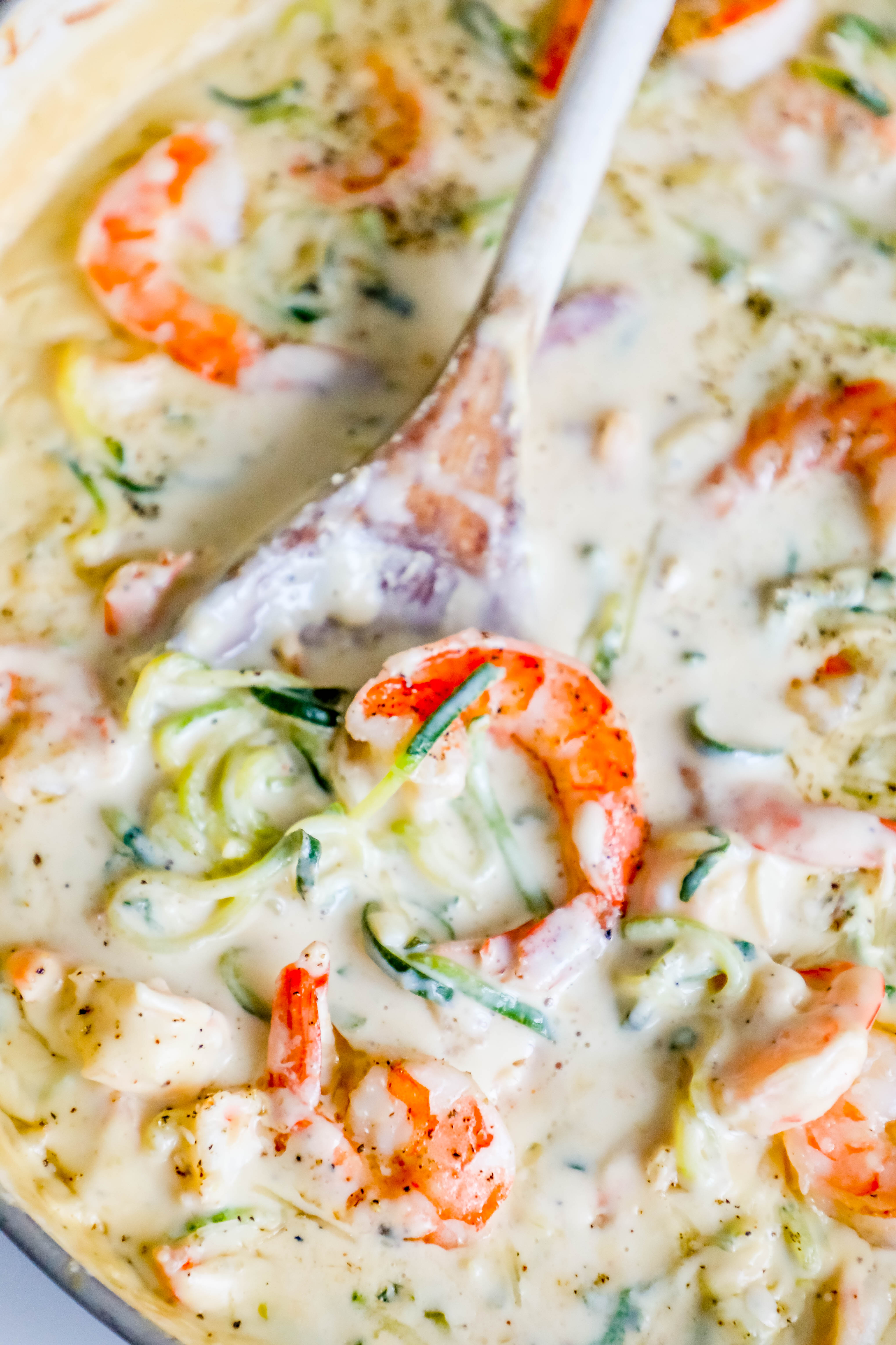 shrimp in a creamy sauce with noodles made out of zucchini