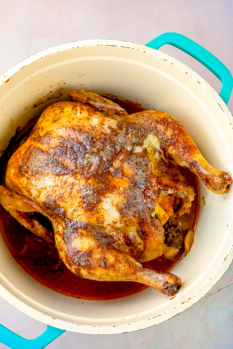 Cajun roasted chicken recipe with sauce on it.