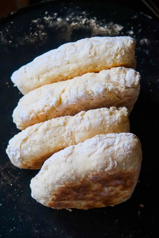 picture of irish potato bread on a black table 