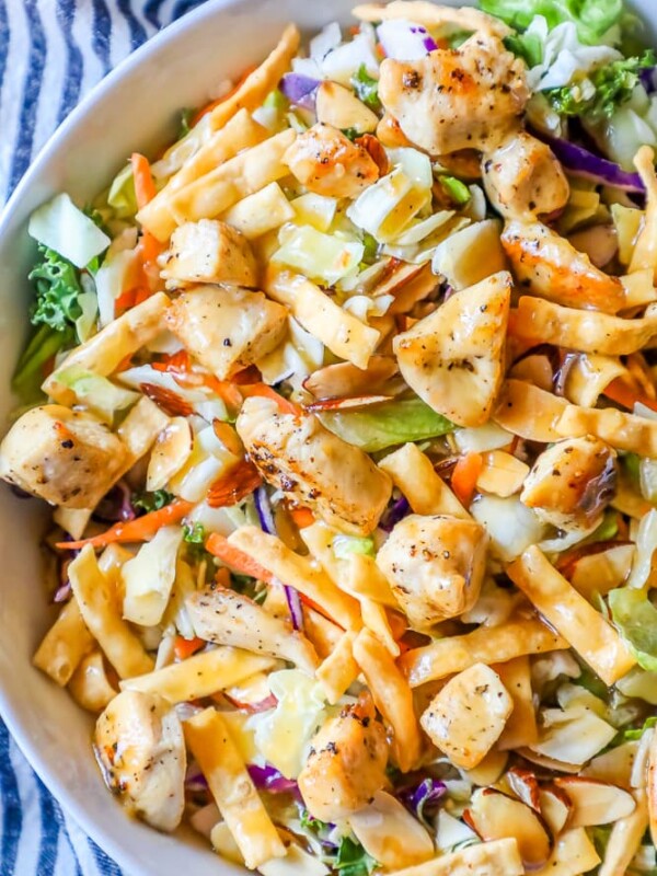 Chicken noodle salad in a white bowl, inspired by The Best Chopped Chinese Chicken Salad.