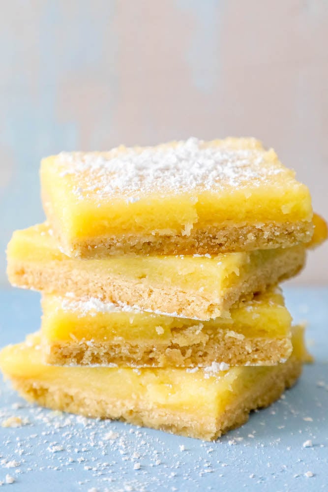 picture of 4 lemon bars stacked on top of each other