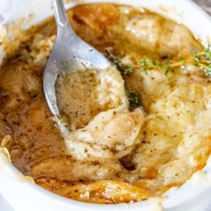 picture of spoon in french onion soup bowl