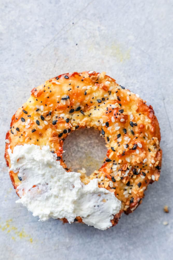 keto everything bagel with cream cheese smeared on one side. 