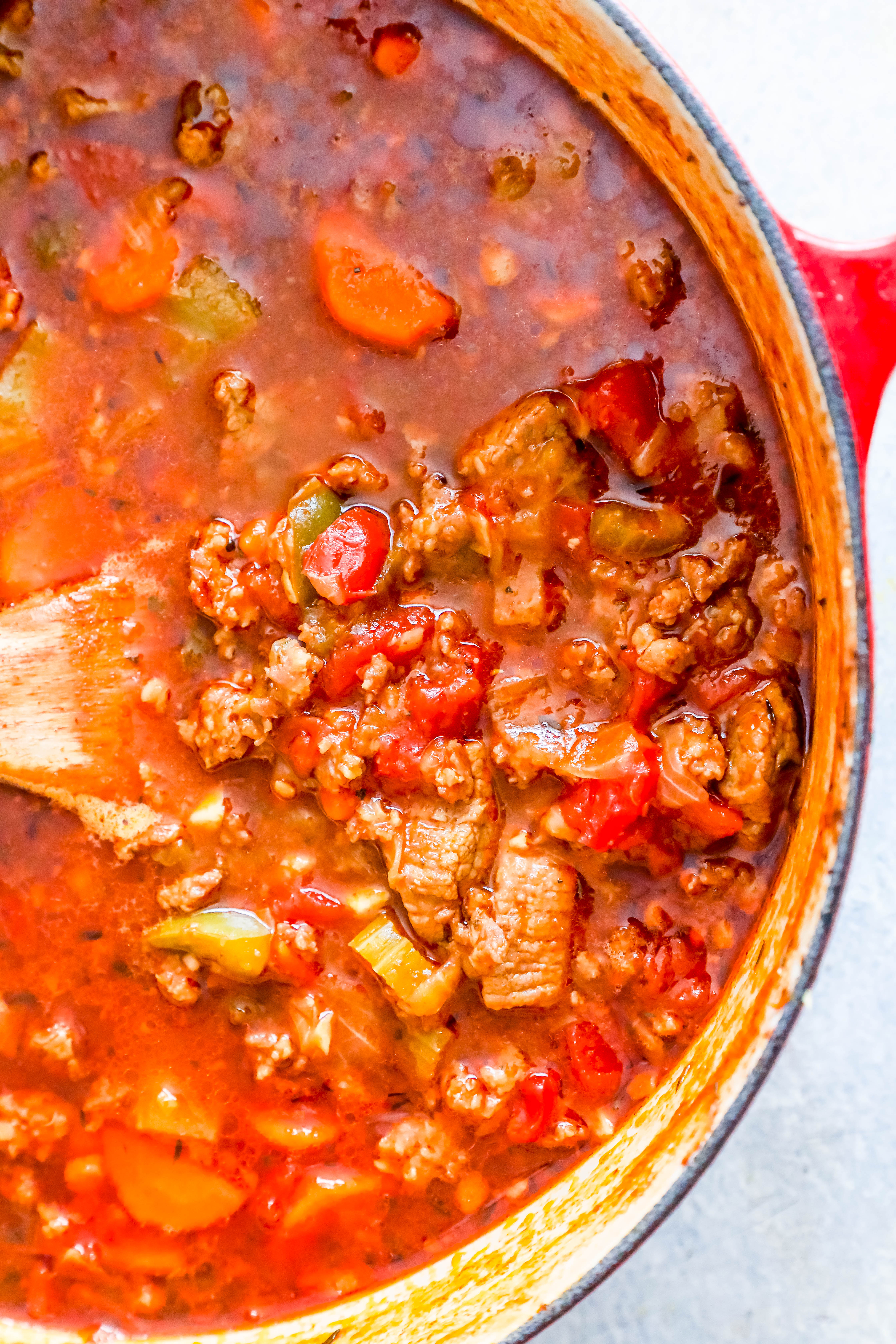 enameled dutch oven with tomato steak and beef keto chili 