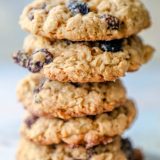 Chewy oatmeal cookies with raisins on top.