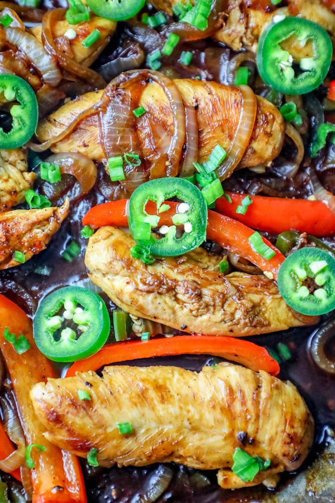 chicken, onions, peppers, and jalapenos in a pot together