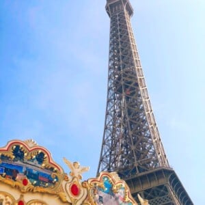 Paris in a day: The Eiffel Tower beside a carousel.