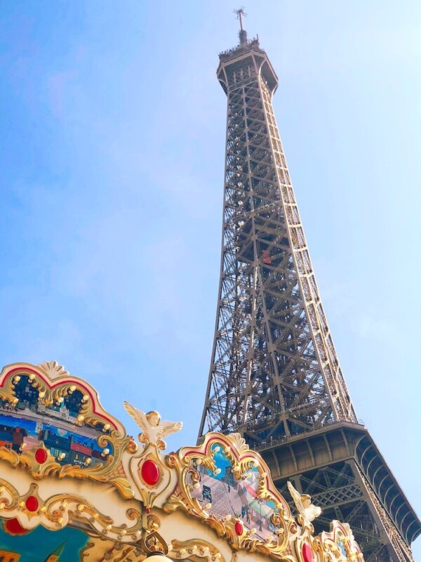 Paris in a day: The Eiffel Tower beside a carousel.