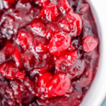 Close-up of bright red cranberry sauce with a glossy texture, perfect for those exploring keto cranberry sauce versions.