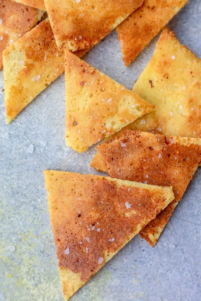 Picture of keto tortilla chips on a plate with dip