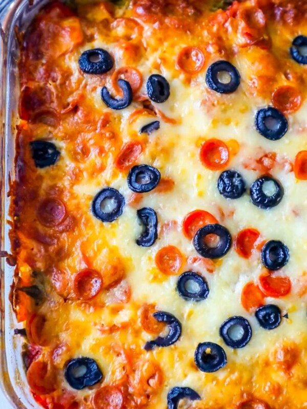 A cheesy low carb pizza casserole topped with olives.