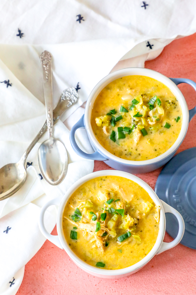 picture of white and blue bowls with cheesy chicken chowder