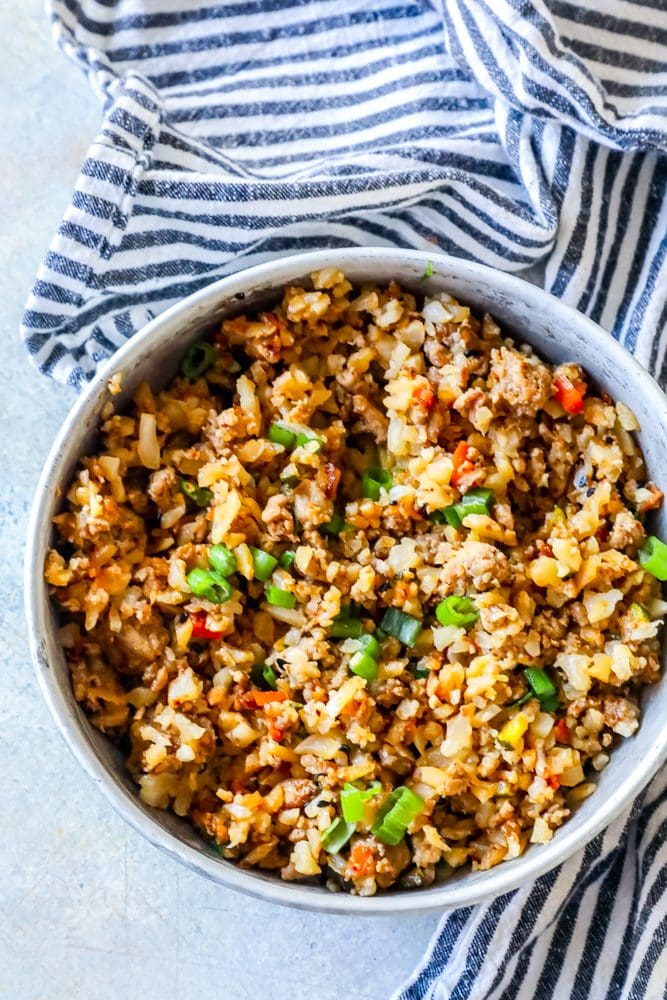 rice, green onions, turkey, peppers, onions in a bowl together