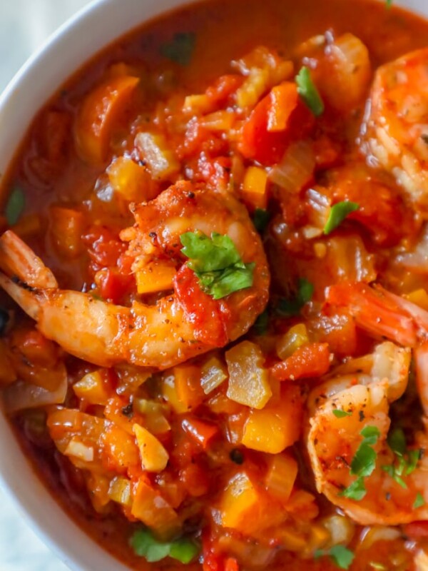 A flavorful one-pot shrimp stew in a bowl on a table.