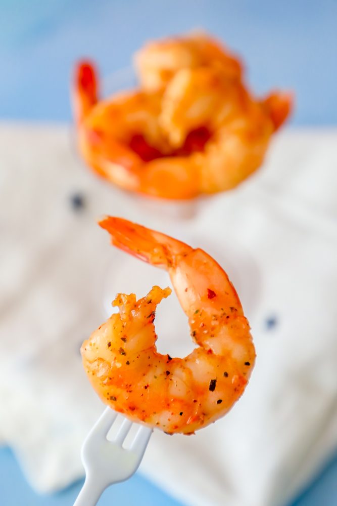 Cajun seasoned shrimp with a fork