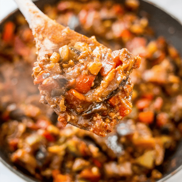 A spoonful of low carb vegetable stew in a pan.