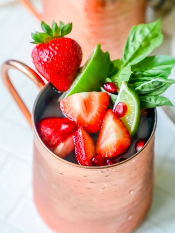 Moscow mule with strawberries and mint.