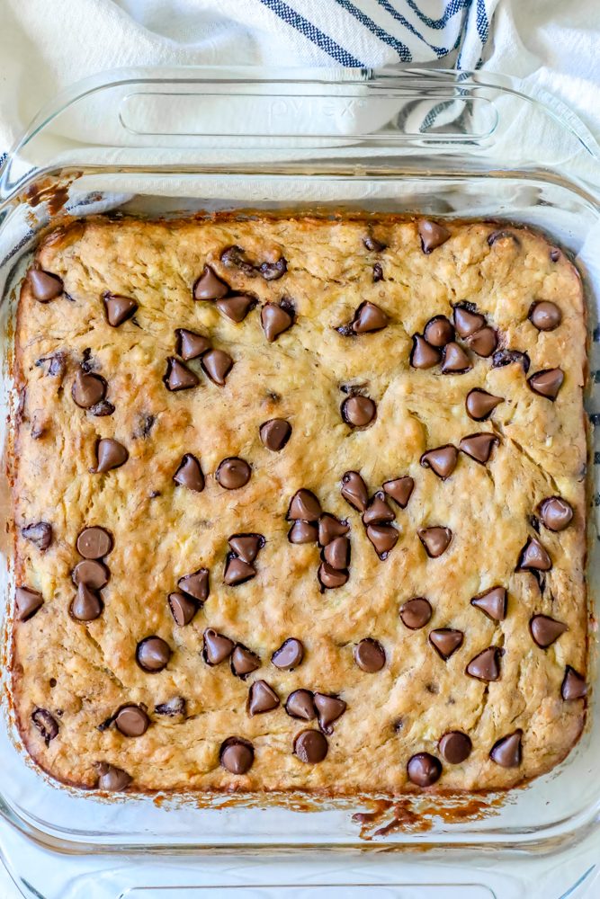 banana chocolate chip bread in a square glass pan. 