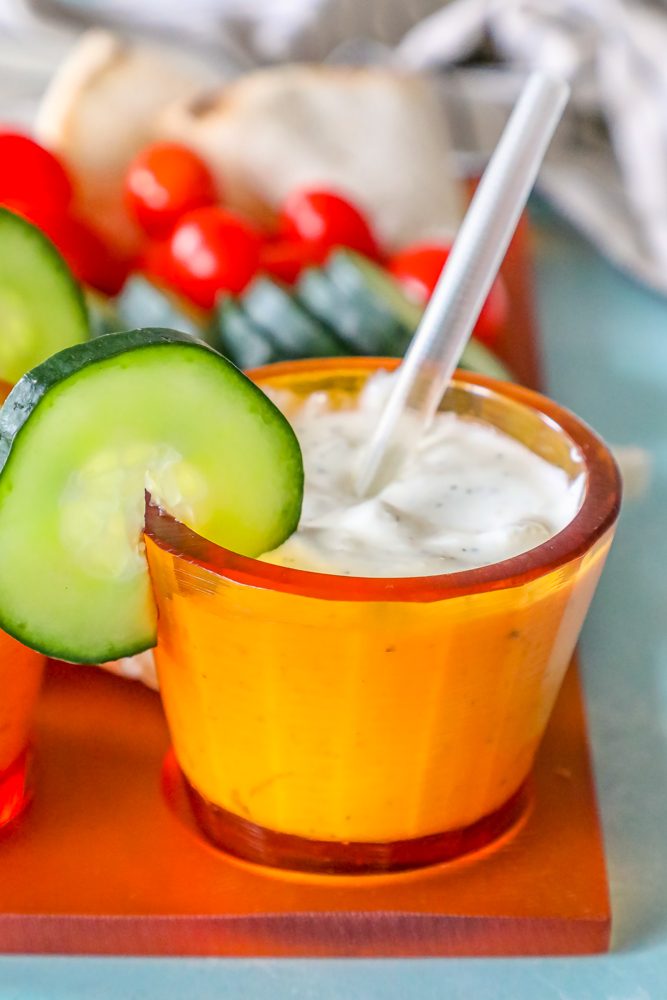 tzatziki dip in a bowl with a spoon