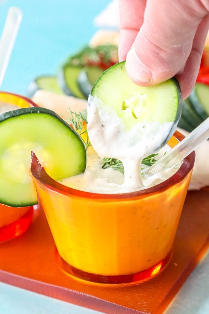 tzatziki in a bowl with a spoon