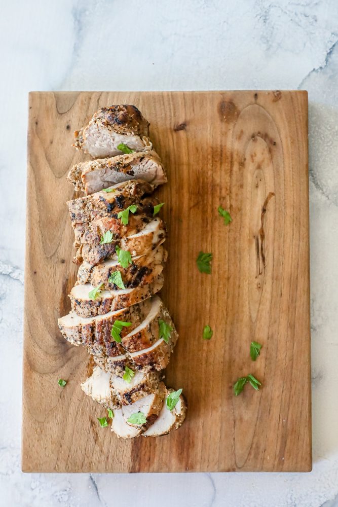 picture of pork tenderloin slices on a cutting board