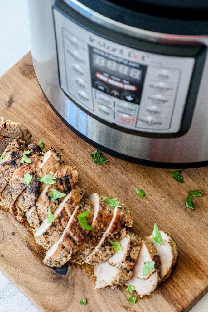 picture of pork tenderloin slices on a cutting board