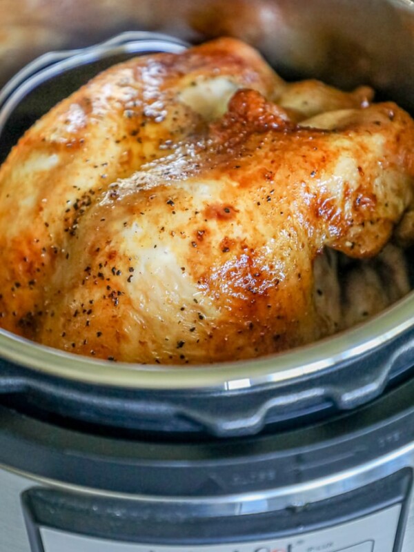 A turkey breast is cooking in an instant pot.