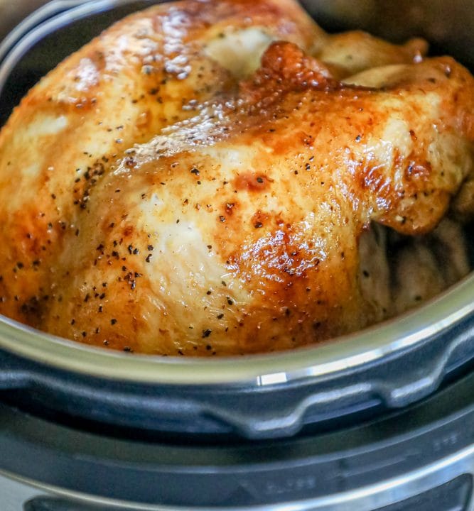 A turkey breast is cooking in an instant pot.