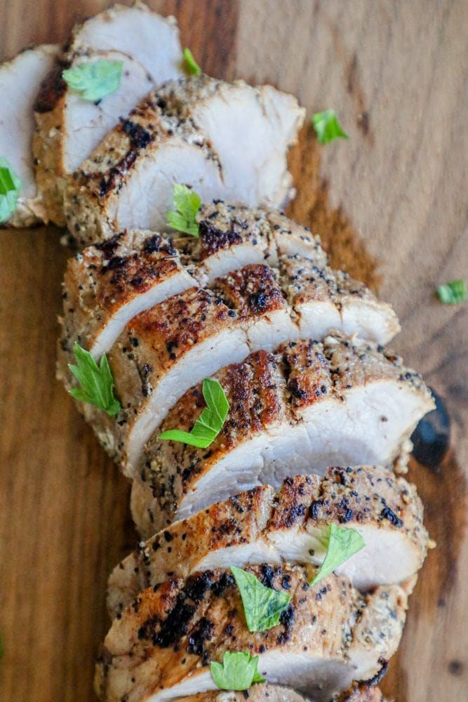 picture of pork tenderloin slices on a cutting board