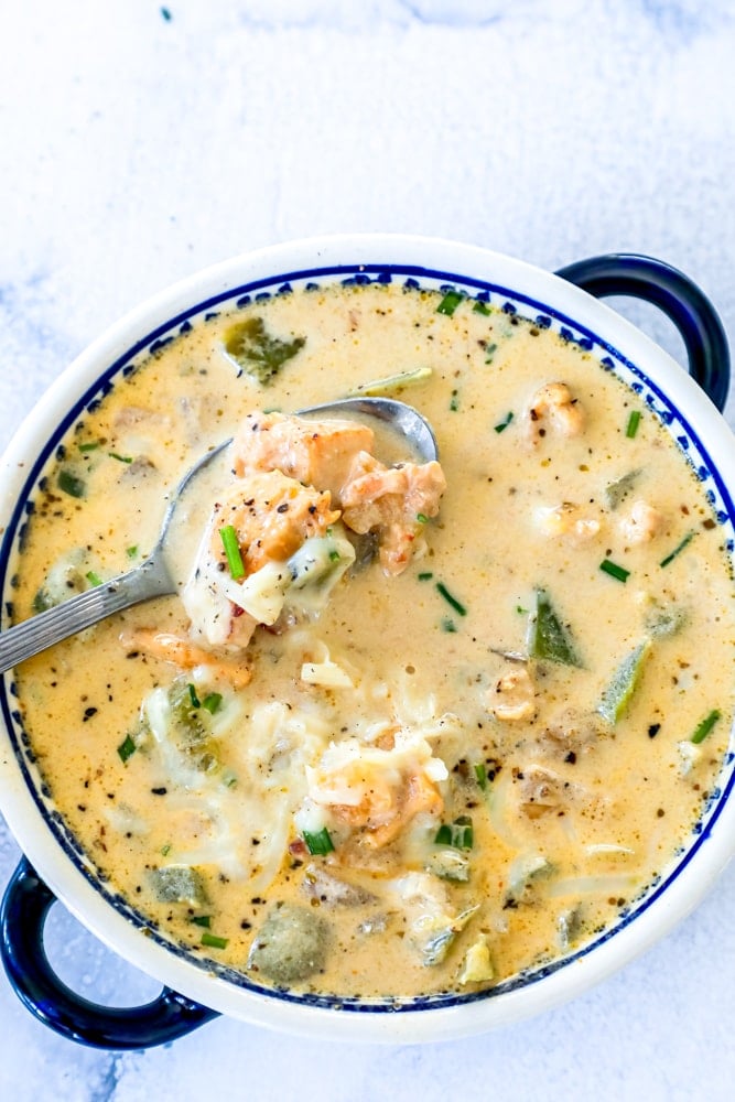 white chicken chili in a bowl with a spoon picture