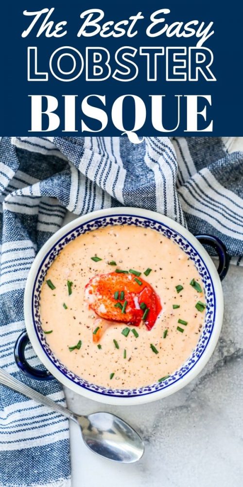 creamy soup with lobster and chives on it