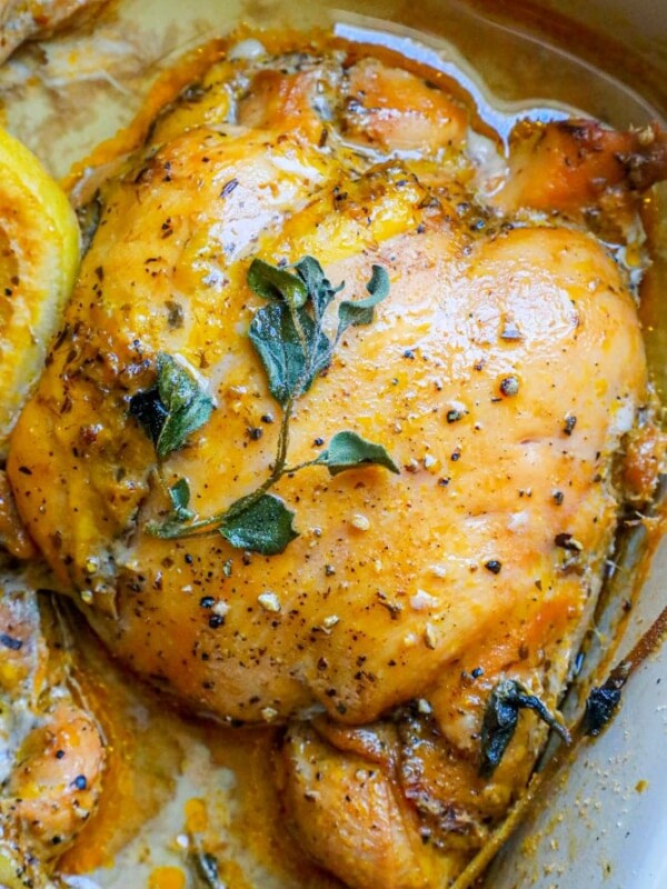 Easy Baked Greek Chicken Thighs Recipe with lemon and thyme.