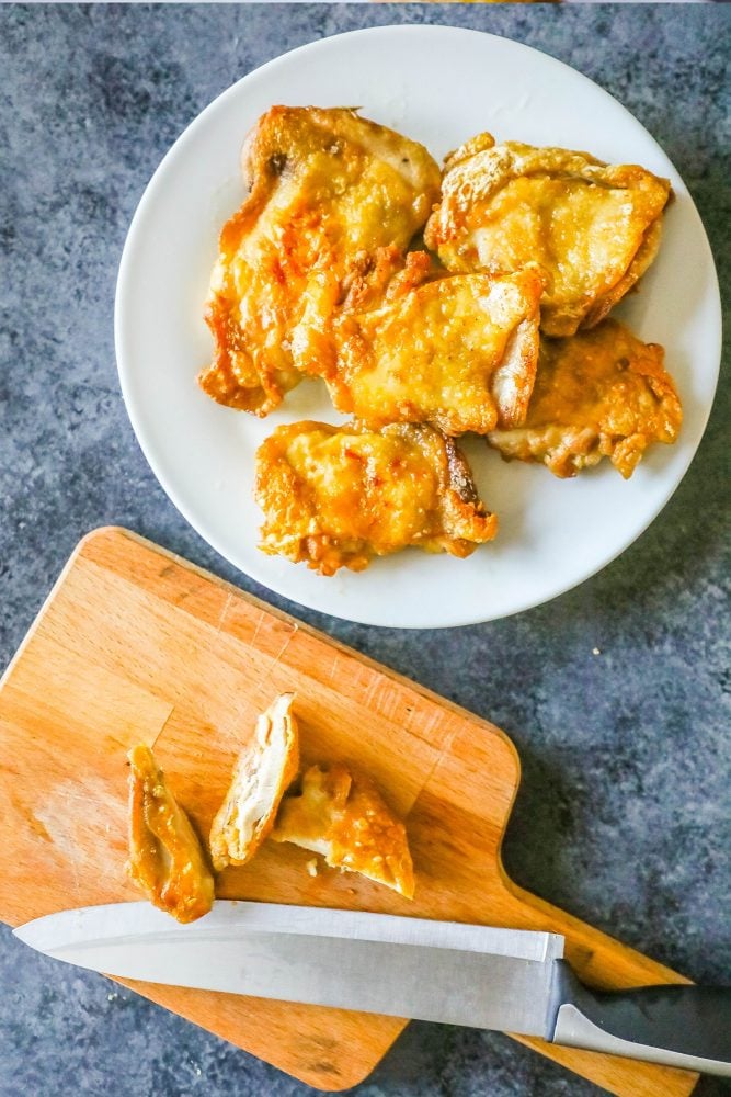 keto fried chicken sitting on a white plate