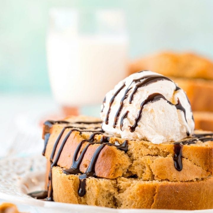 Easy peanut butter french toast with chocolate sauce and ice cream on a plate.