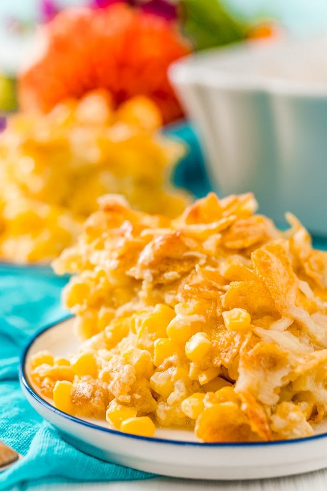 scalloped corn with cornflakes in a white plate