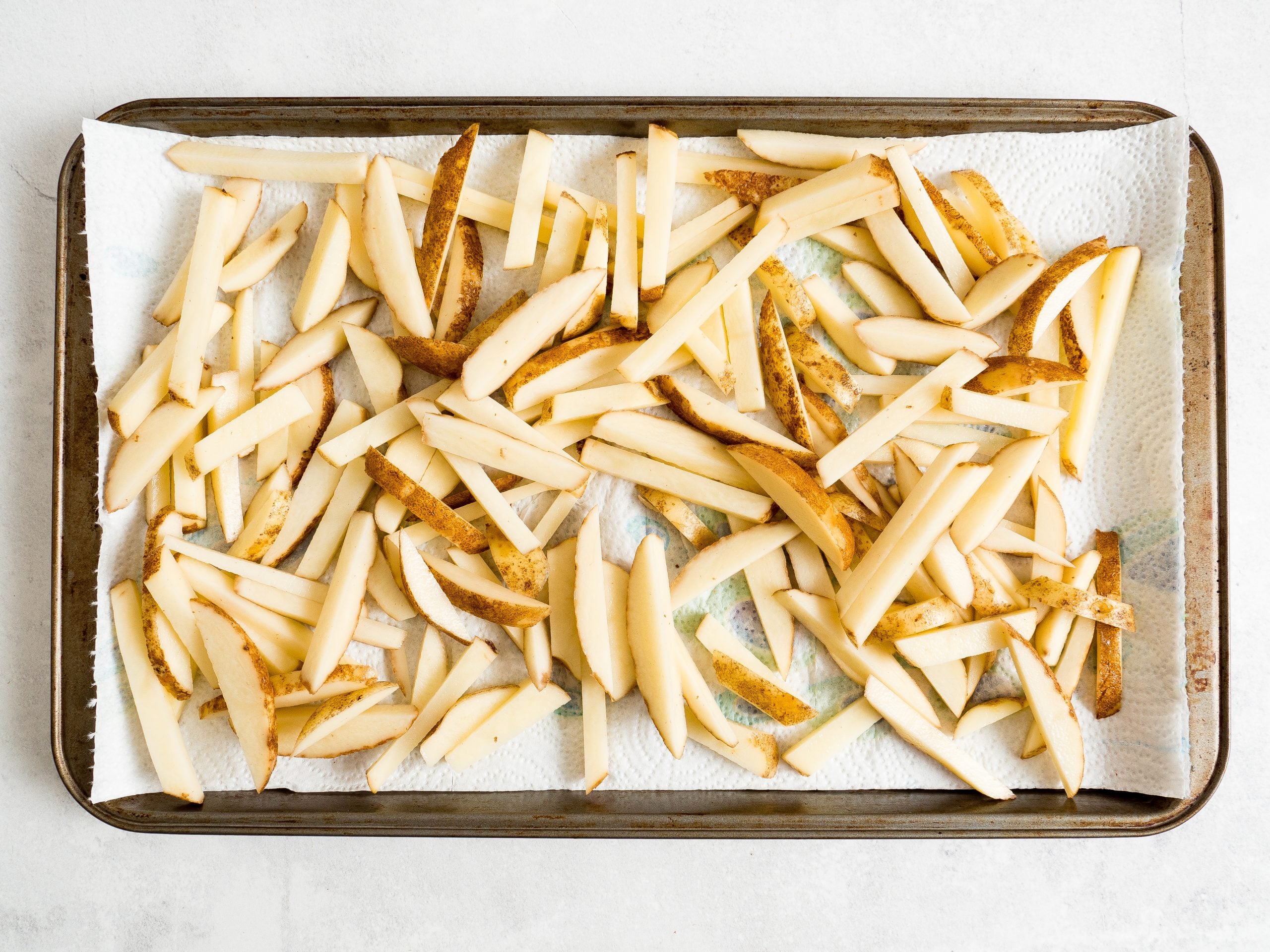 french fries drying on paper towel picture