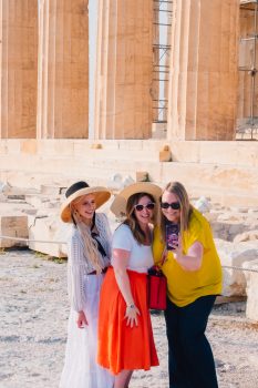 picture of three women taking a selfie in front of the Parthenon, Athens Greece