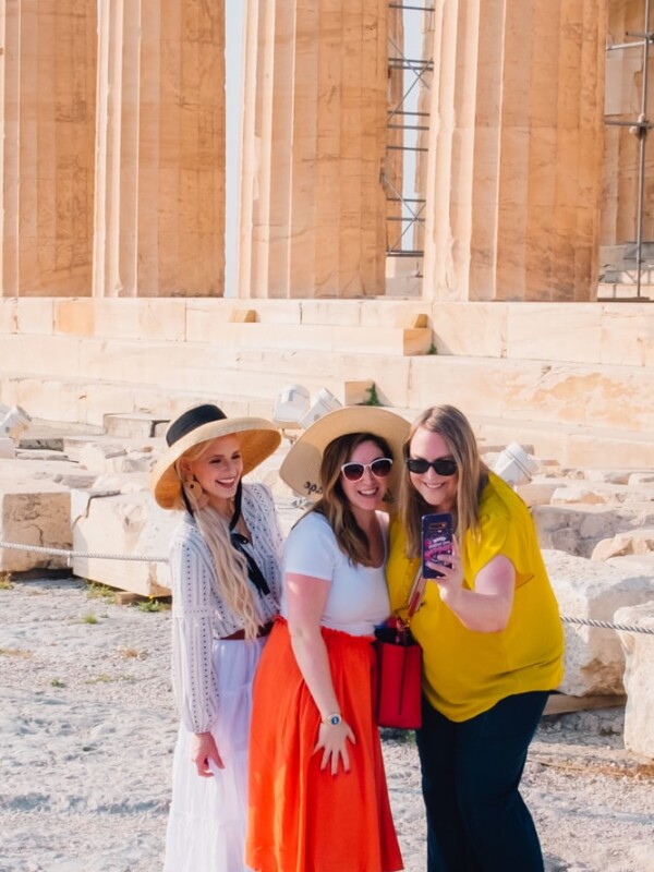 picture of three women taking a selfie in front of the Parthenon, Athens Greece