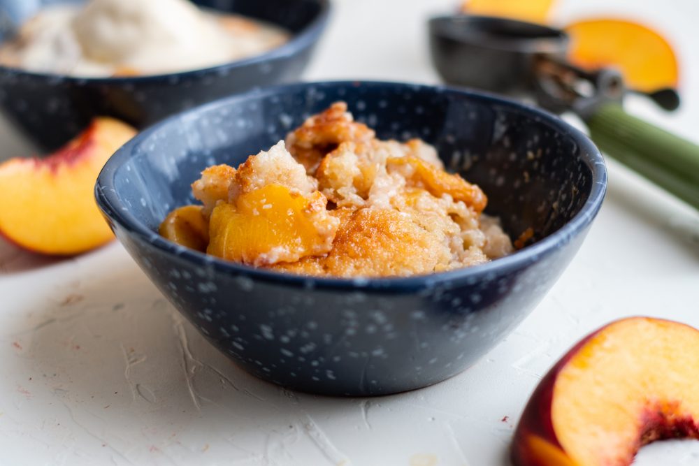 picture of peach cobbler in a bowl 